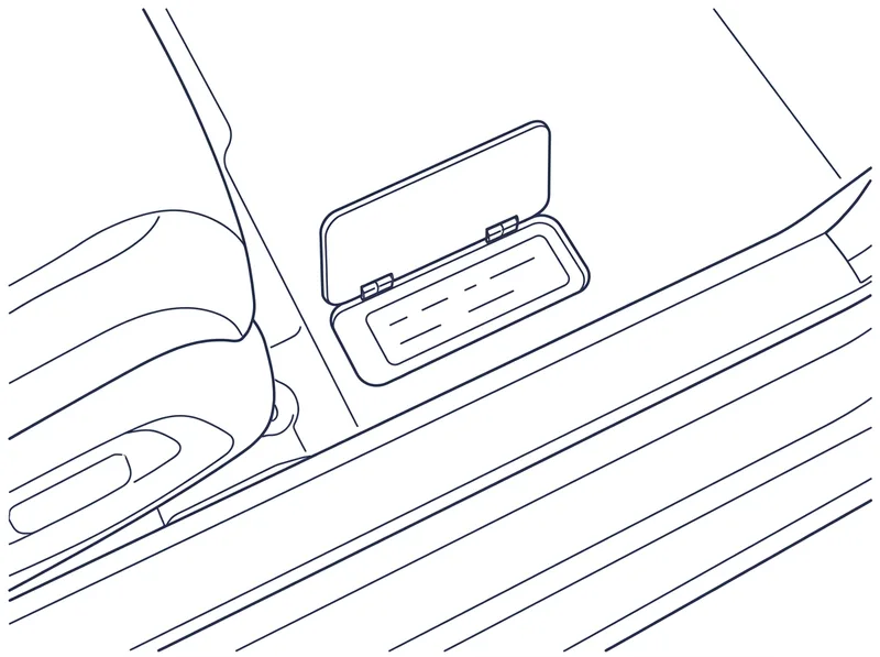 The VIN stamped into the floor beside the driver's seat, under a small cover in the carpet by the door sill