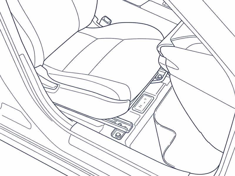 The VIN stamped into the floor beside the driver's seat, with the carpet folded back