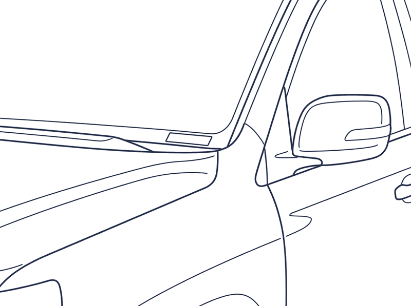 The VIN plate on top of the dashboard at the base of the windscreen, passenger side, seen from outside